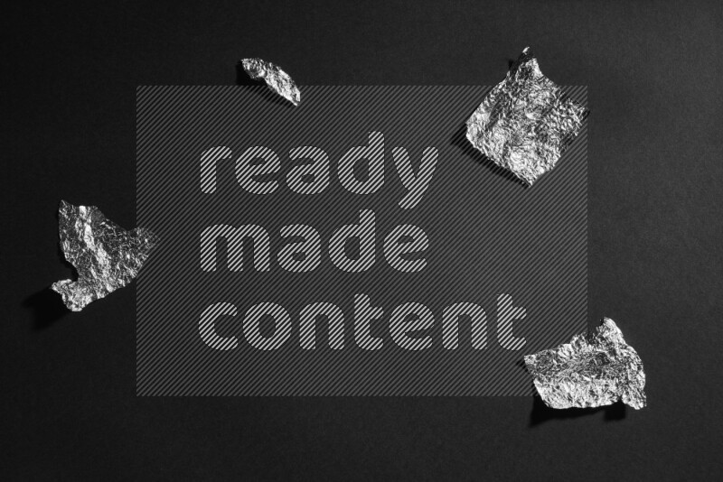 Aluminium foil on black background