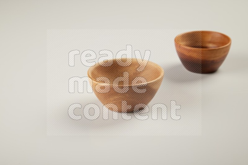 Wooden bowl on white background