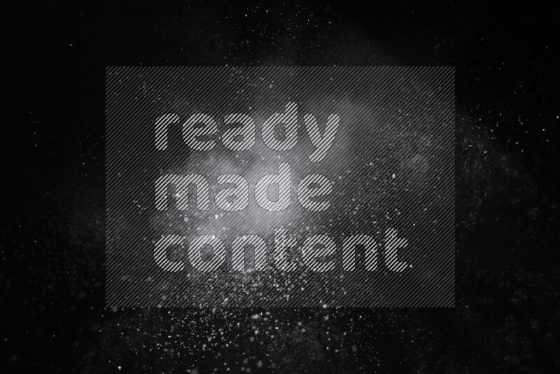 White powder explosion on black background