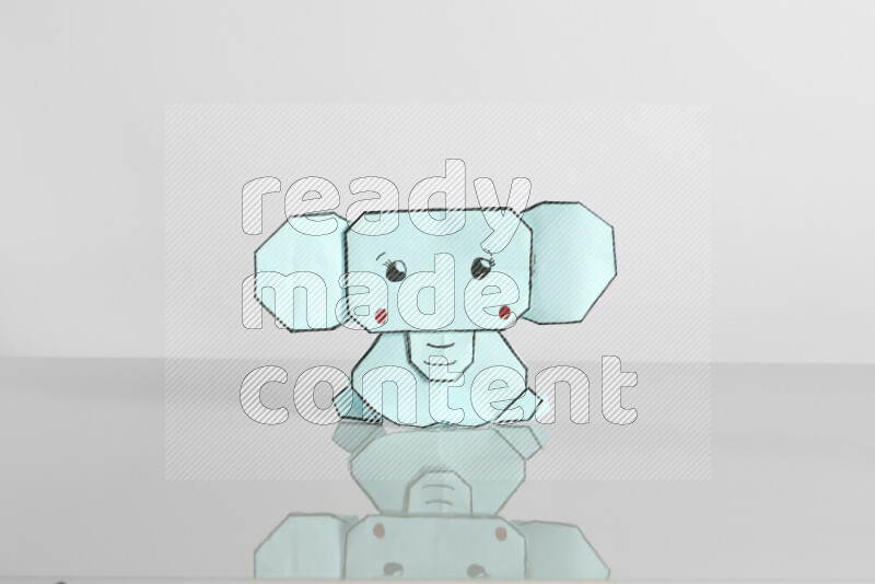 Origami animals on grey background