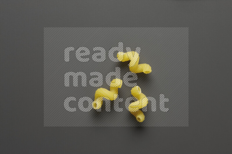Twist pasta on grey background