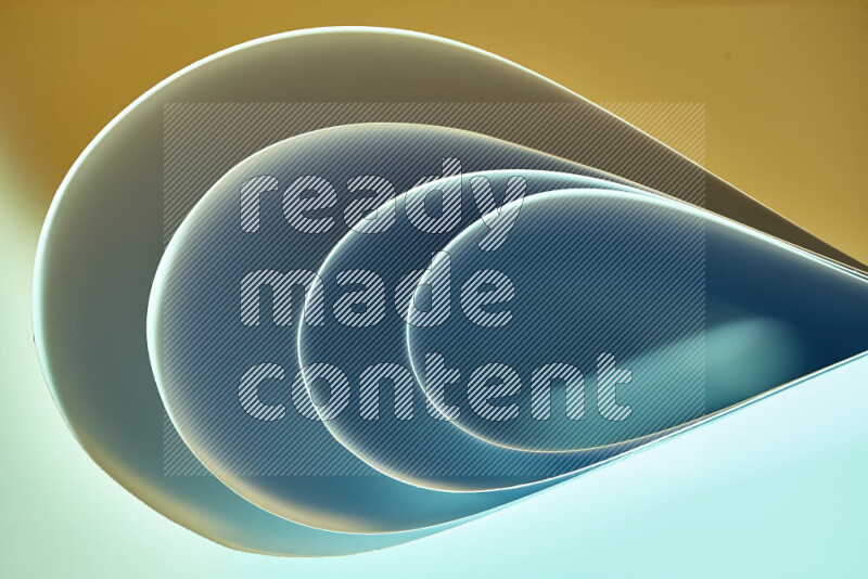 An abstract art of paper folded into smooth curves in green and yellow gradients