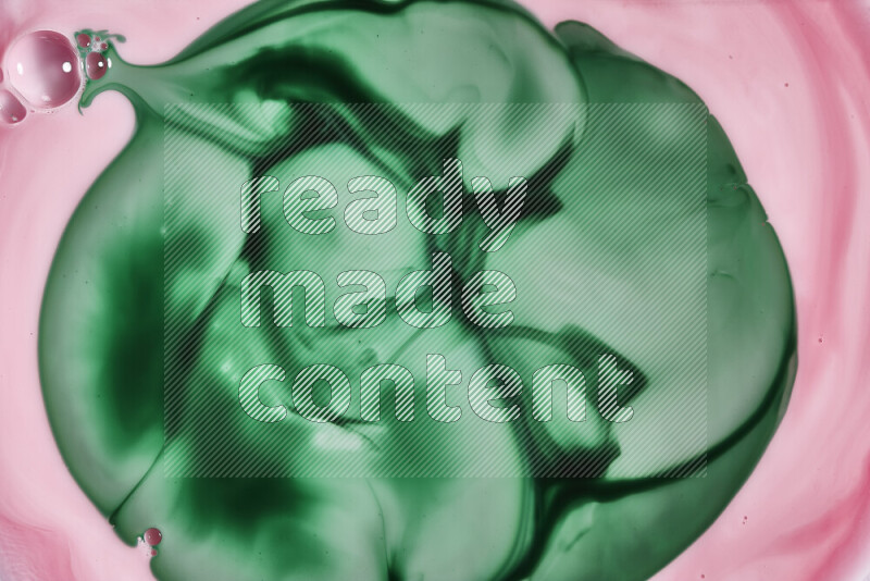 A close-up of abstract swirling patterns in red and green