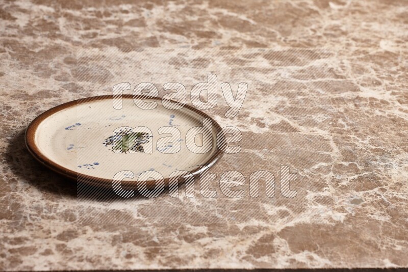 Decorative Pottery Plate on Beige Marble Flooring