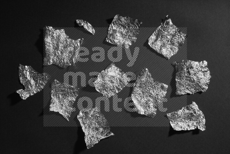 Aluminium foil on black background
