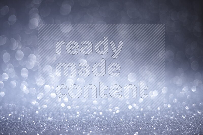 Silver glittery bokeh background