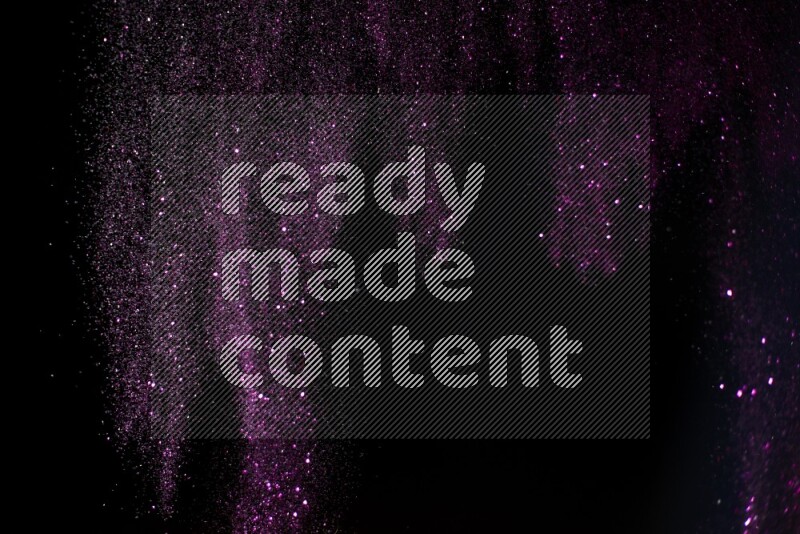 Pink glitter powder isolated on black background