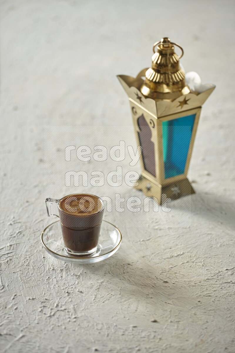 A golden lantern with different drinks, dates, nuts, prayer beads and quran on textured white background