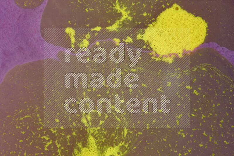 The image depicts a marbling effect with swirling patterns of purple and yellow