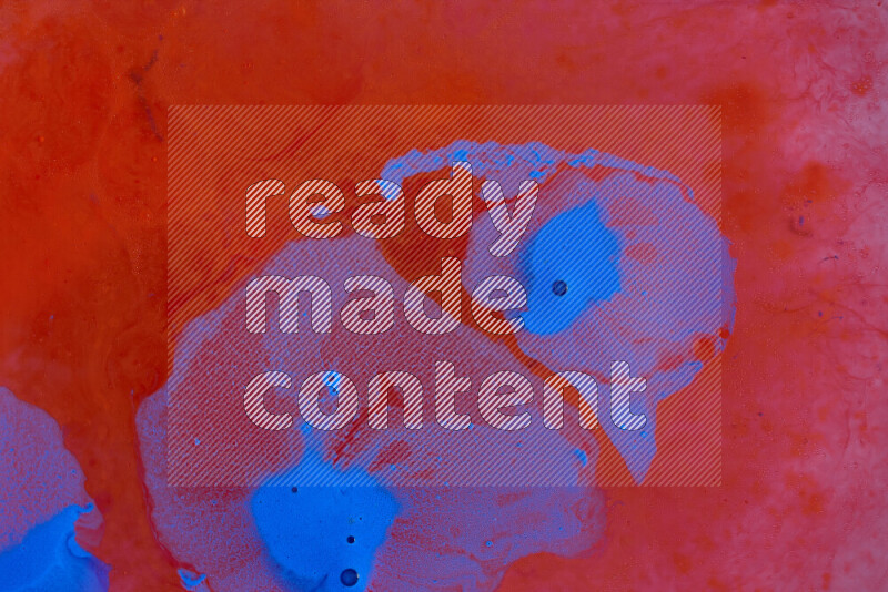 The image depicts a marbling effect with swirling patterns of red and blue