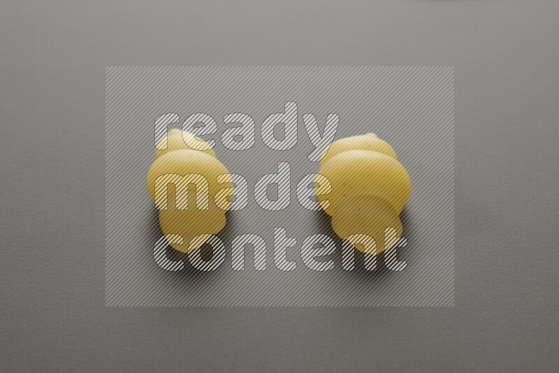 Snails pasta on grey background