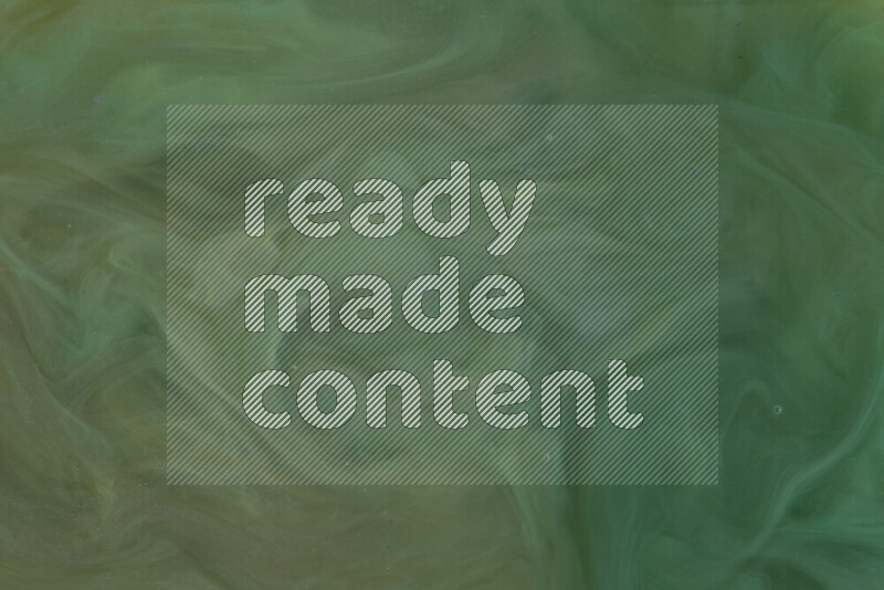 The image captures a dramatic splatter of green paint over a white backdrop