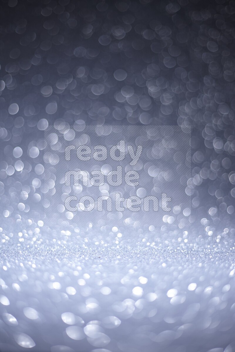Silver glittery bokeh background