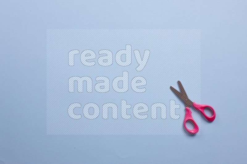 Different school supplies on blue background