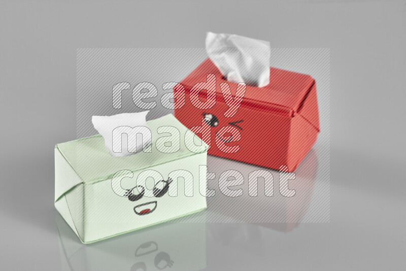 Origami tissue box on grey background