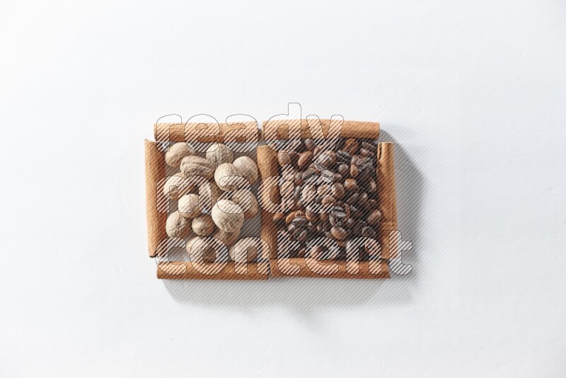 2 squares of cinnamon sticks full of coffee beans and nutmegs on white flooring