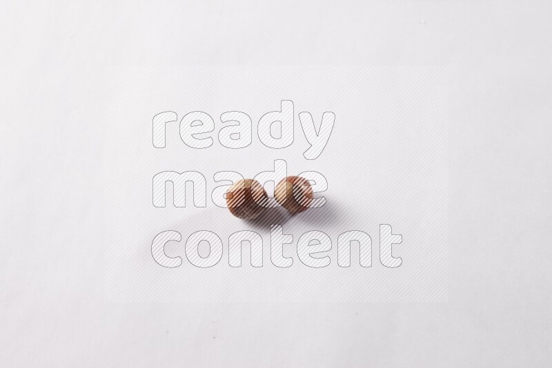 Hazelnuts on white background