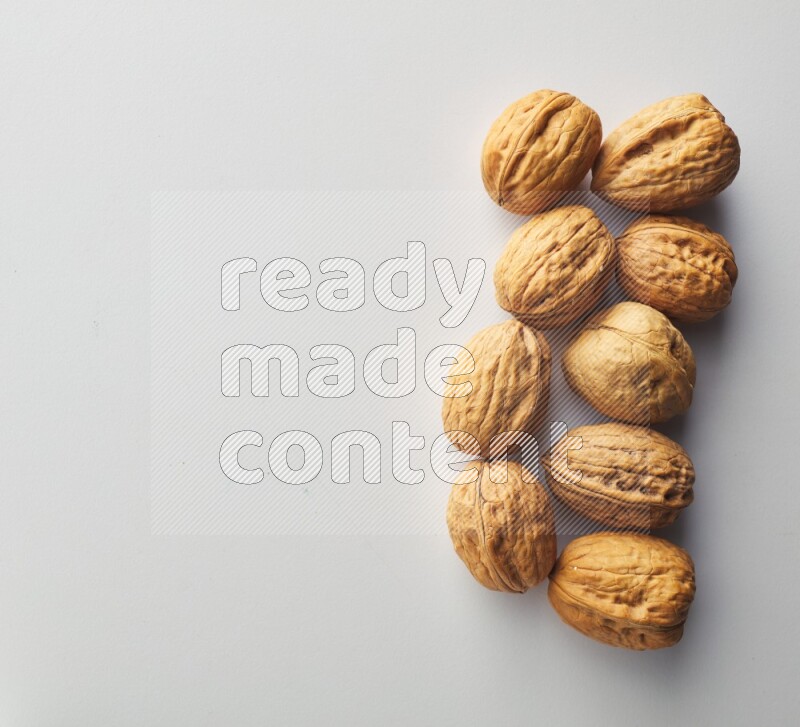 Top-view shot of walnut on white background