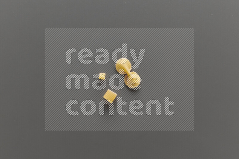 Different pasta types on grey background