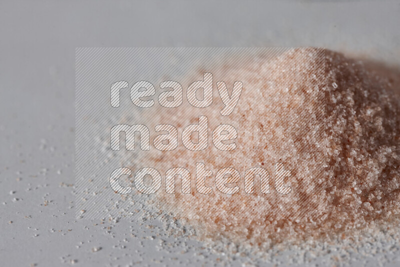 A bunch of fine himalayan salt on white background