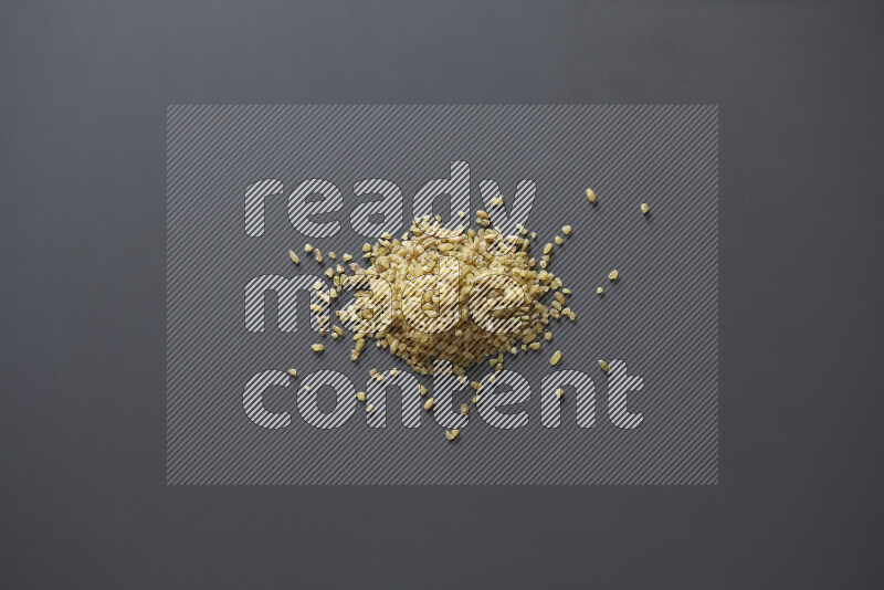 Coarse bulgur on grey background