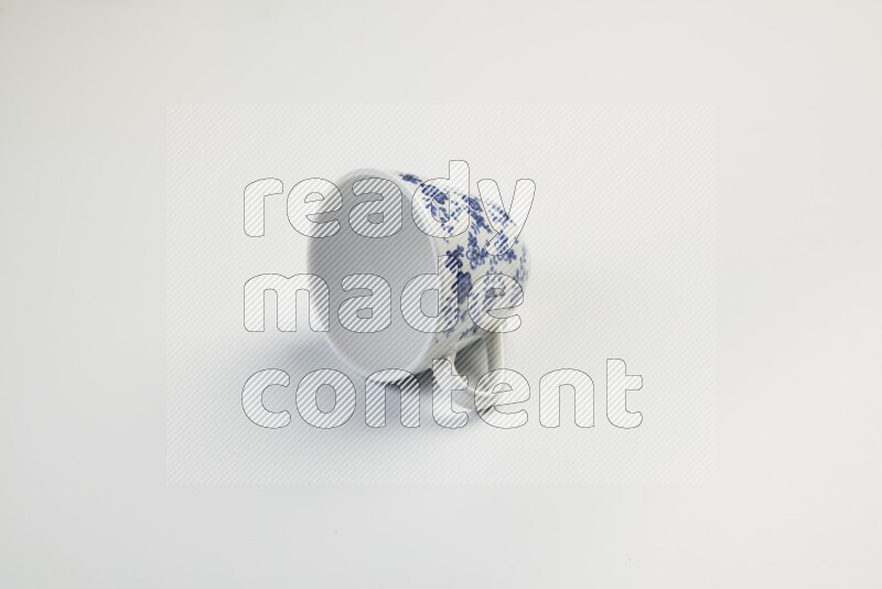 white and blue mug on white background