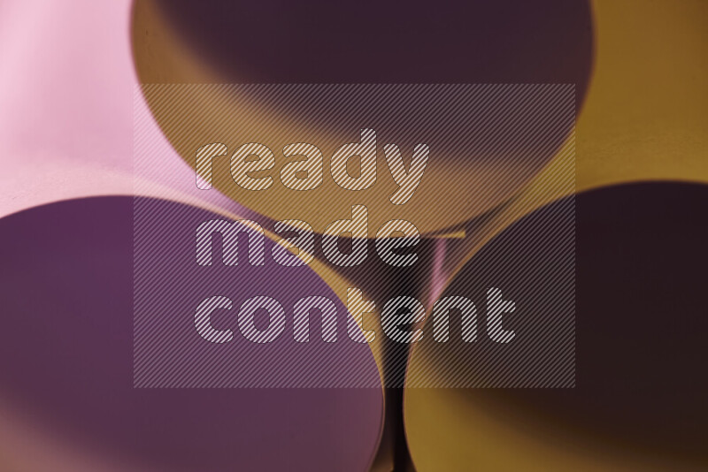 The image shows an abstract paper art with circular shapes in varying shades of pink and warm tones