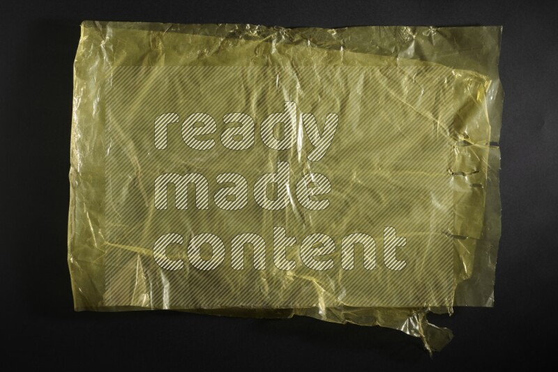 Colored plastic textures on black background