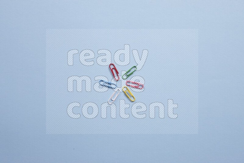 Different school supplies on blue background