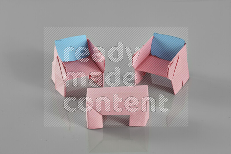 Origami living room on grey background