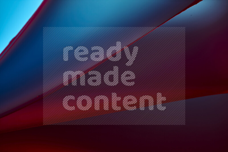 An abstract art piece displaying smooth curves in warm and cold gradients created by colored light