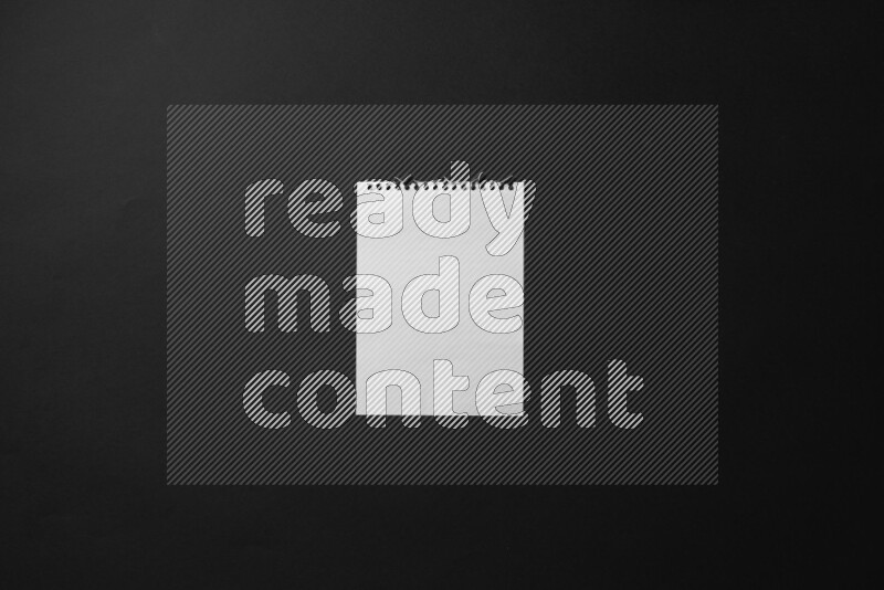 Notebook sheet on black background