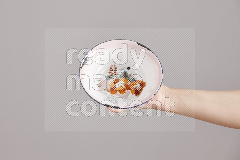 Woman hands holding different metal essentials in different positions
