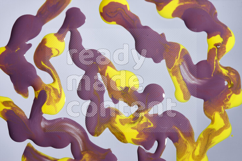 Abstract colorful background with mixed of purple and yellow paint colors