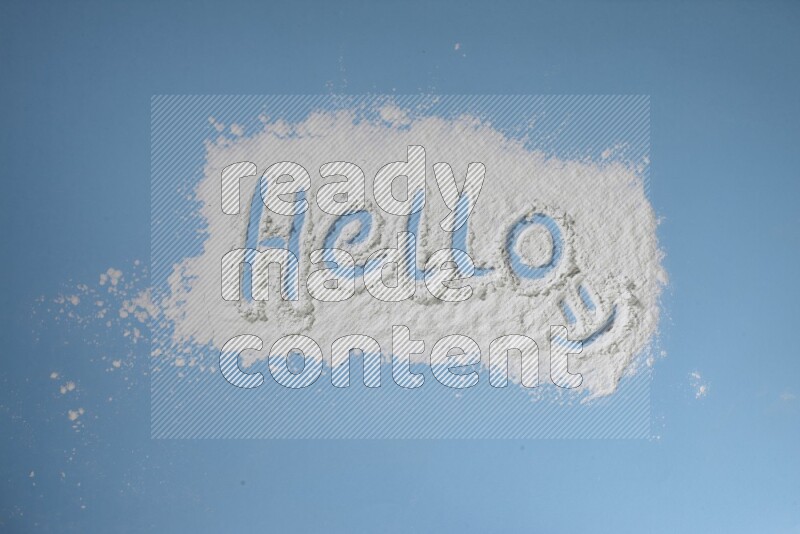 A word written with white powder on blue background
