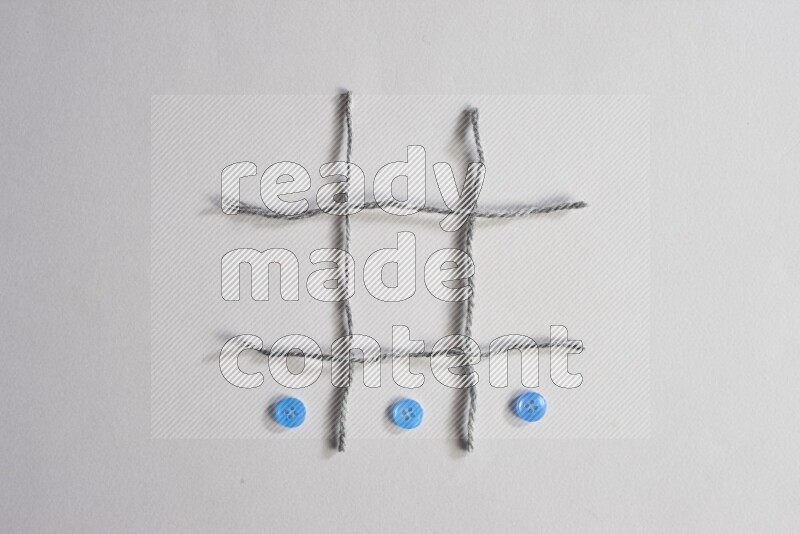 Blue buttons placed on grey background