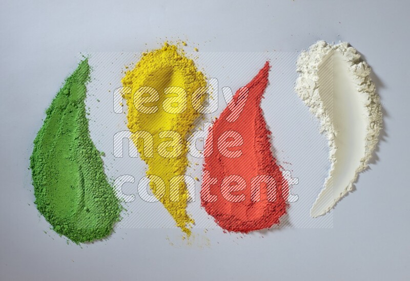 Multicolored powder smears on white background