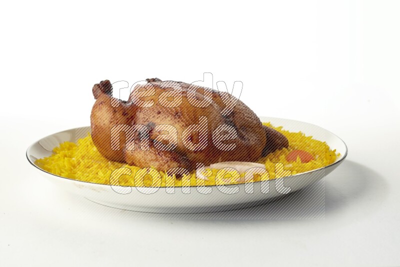 yellow  basmati Rice with kabsa chicken pieces on a white plate with a silver rim direct on white background
