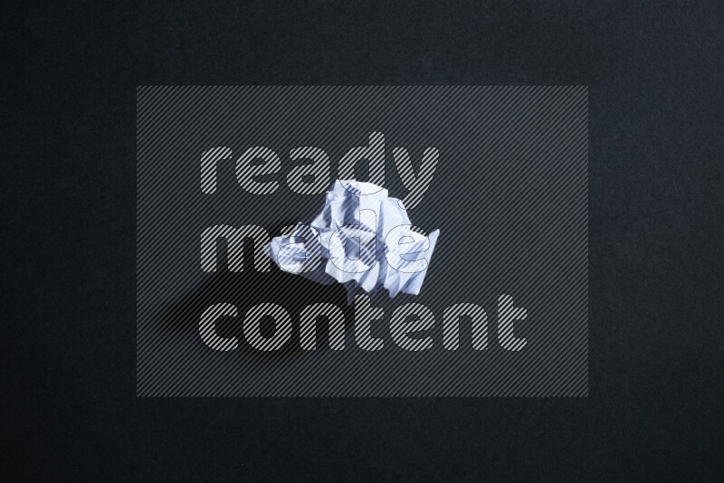 White paper sheet on black background