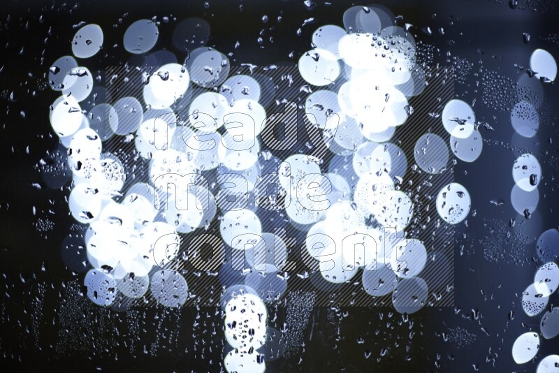Bokeh light in white with water drops