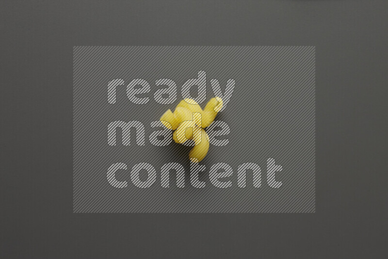 Twist pasta on grey background