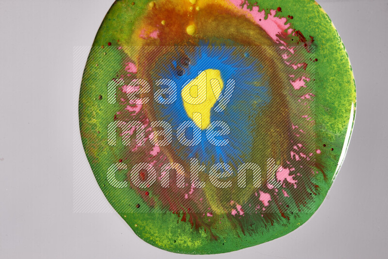 Close-ups of assorted colors blending on a grey background