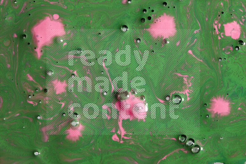Abstract colorful background with mixed of pink and green paint colors