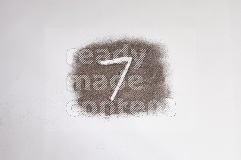 Numbers written with glitter on white background