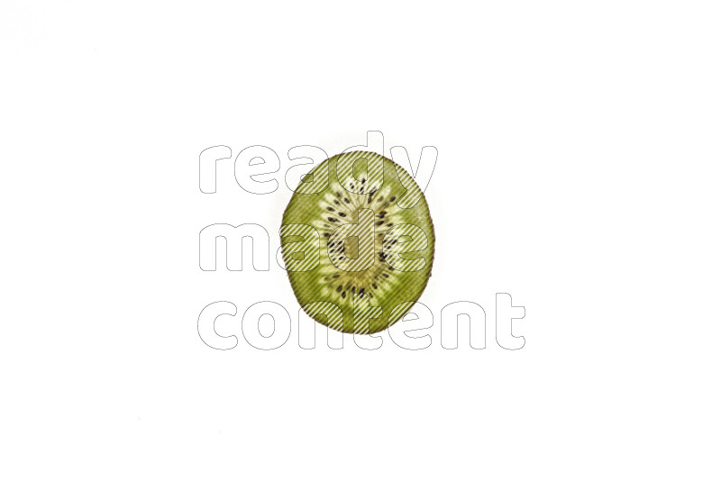 Kiwi slices on illuminated white background