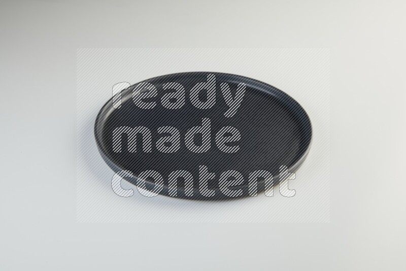 white and black plates on white background