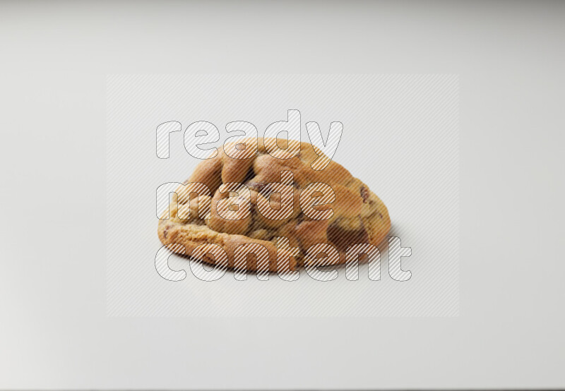 a chocolate chip cookie on a white background