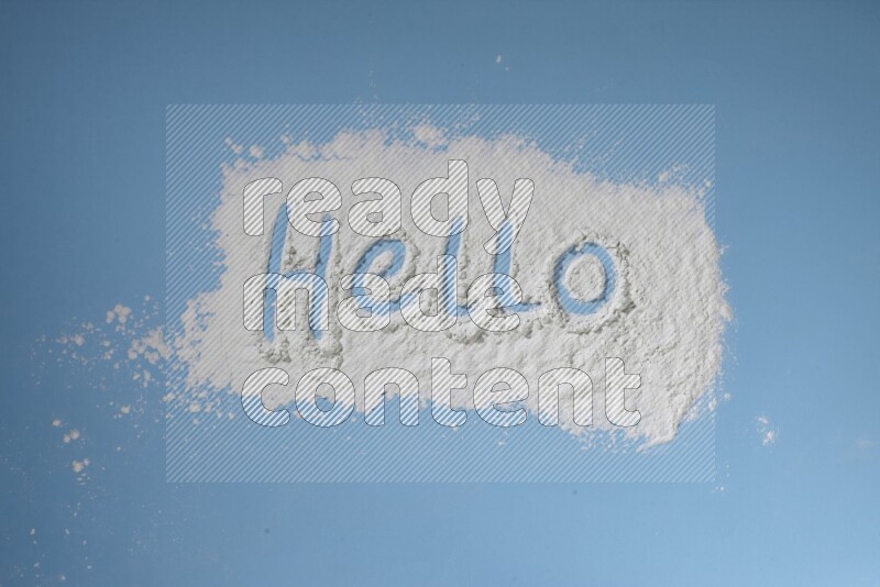 A word written with white powder on blue background