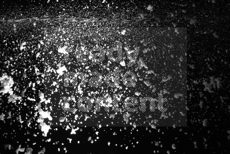 Snow spray on black background