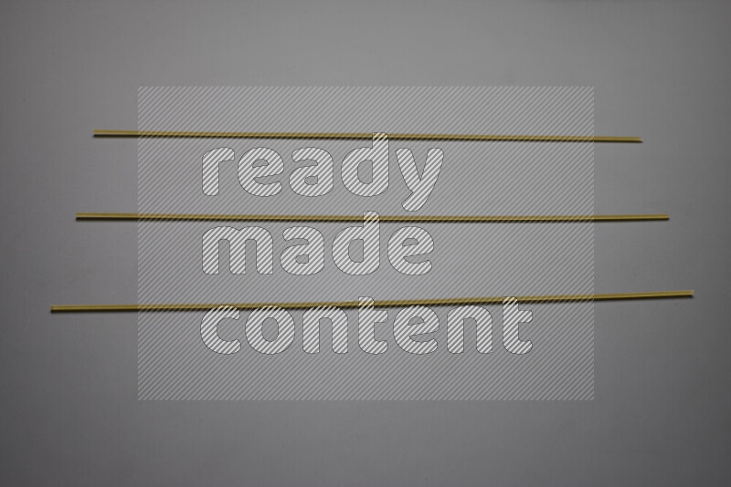 Spaghetti pasta on grey background